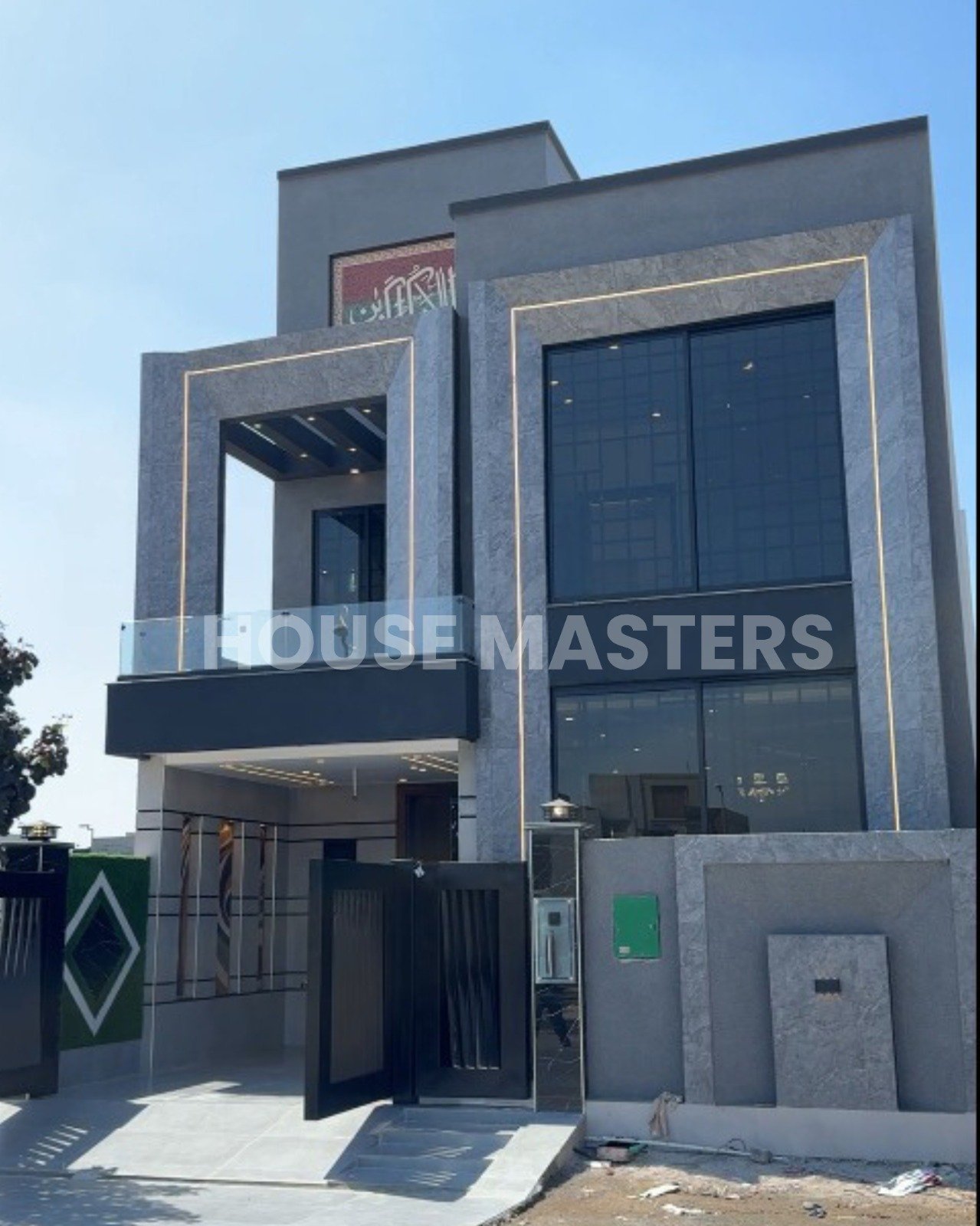 Brand new 5 Marla luxury house exterior with modern architecture, large windows, and grey facade in Bahria Orchard, Lahore.