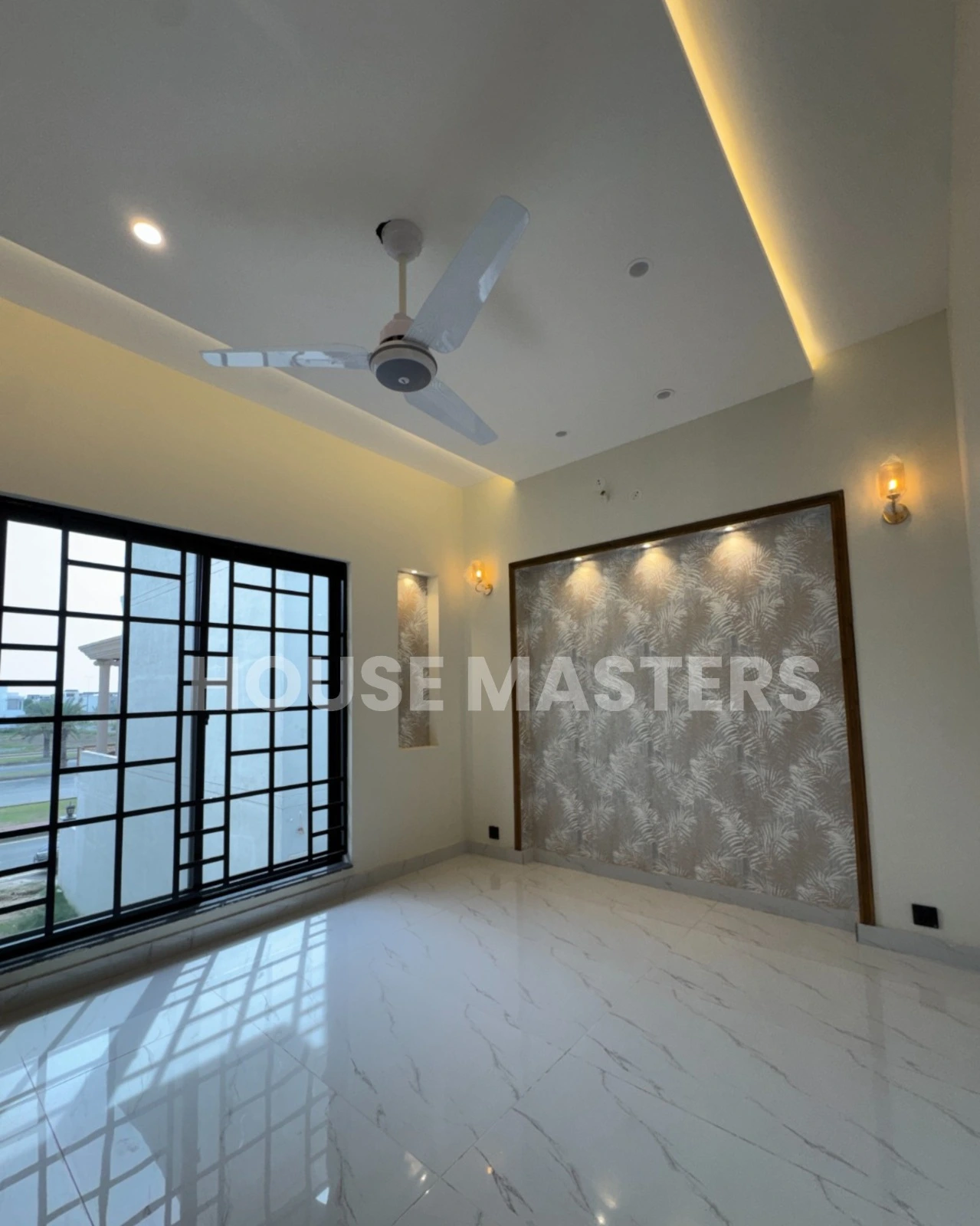 modern bedroom with window lighting Bahria Orchard Lahore house