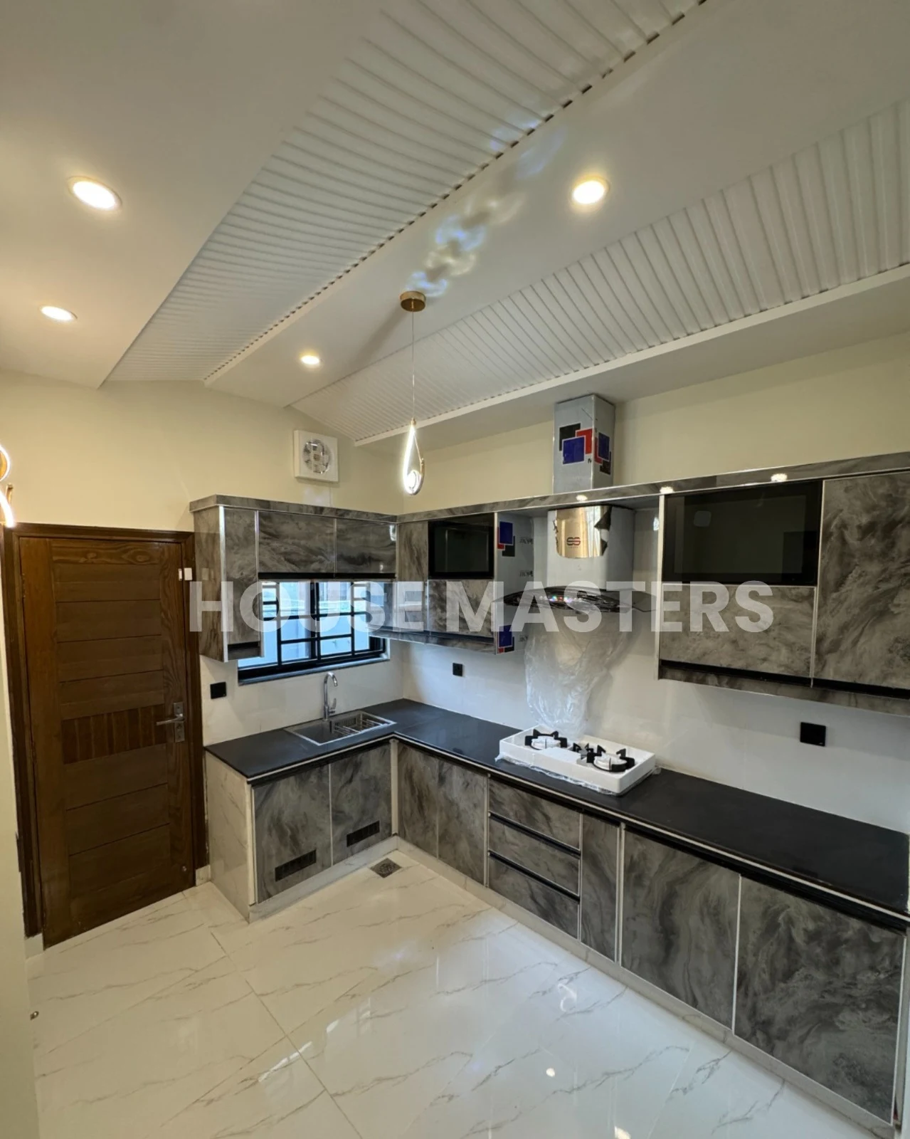 modern kitchen design house for sale in Bahria Orchard Lahore cabinets and fittings